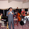 Alan Zavod (piano), George Benson, Ray Carter (bass), Stan and Cleve Huff (drums) at the Wrigley Mansion